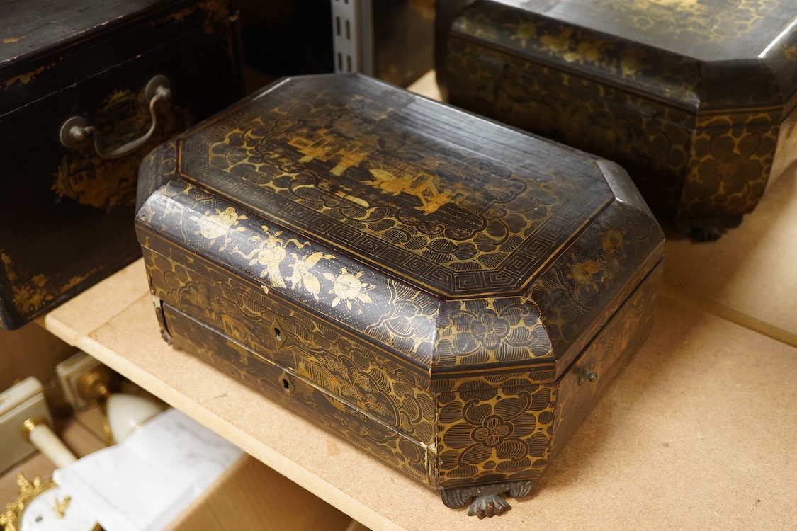Three 19th-century Chinese gilt-decorated black lacquer sewing boxes, two containing bone sewing accessories, together with a similar tea chest (4) largest box- 33.3cm wide x 20cm high